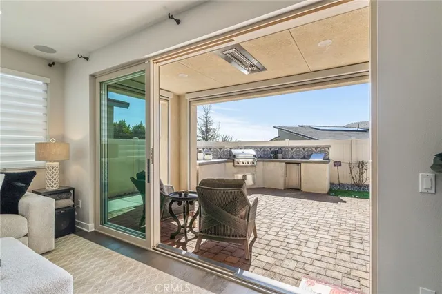 a view of a living room and entry way