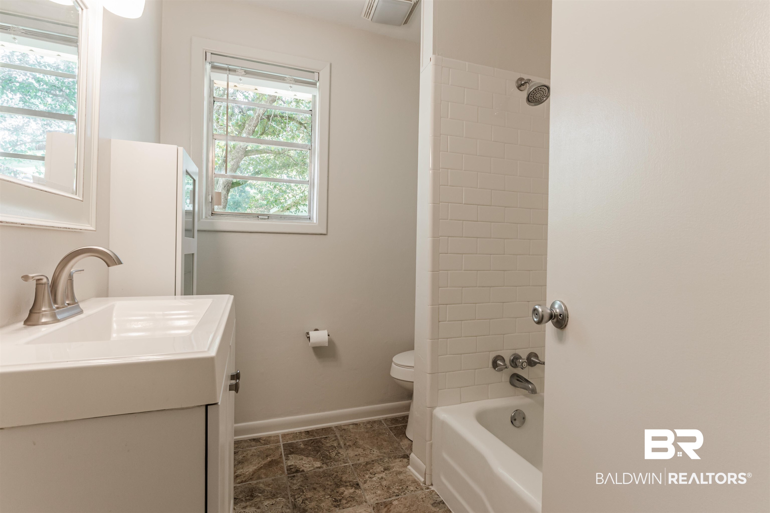 3970 Oak Ridge Avenue Mobile, AL 36619 - Photo 21 of 28 Full bathroom with tiled shower / bath, vanity, and toilet