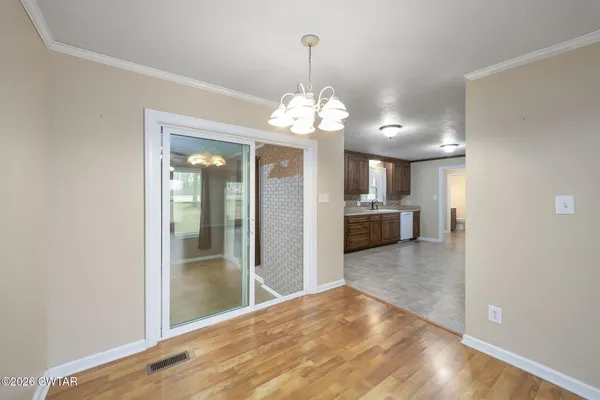 a view of a kitchen and a sink