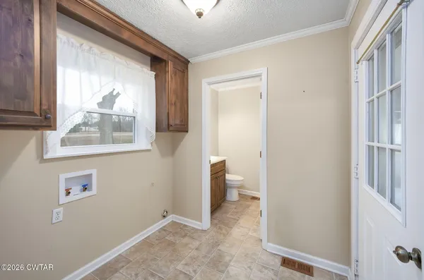 a view of a room that has a window in it