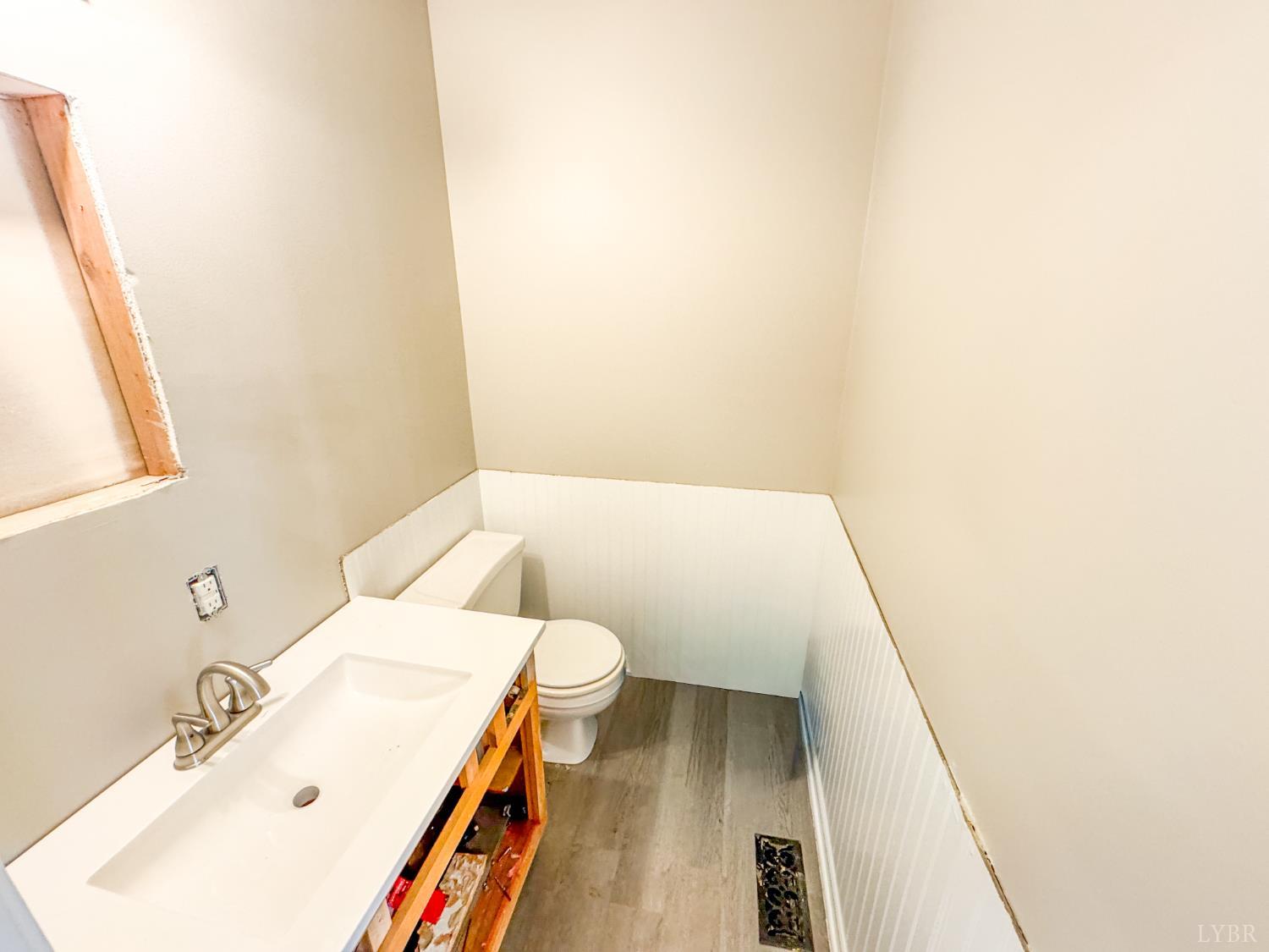 6280 Watchrun Drive Prince George, VA 23875 - Photo 10 of 47 a bathroom with a sink and a mirror