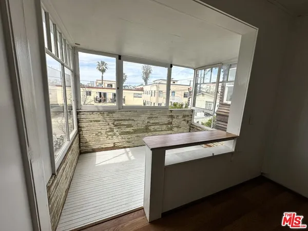 a view of open kitchen with granite countertop sink and dishwasher