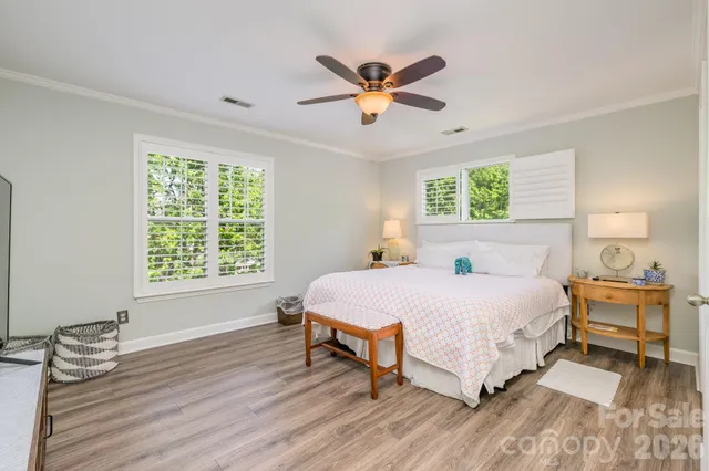 a kitchen with stainless steel appliances a refrigerator sink and cabinets