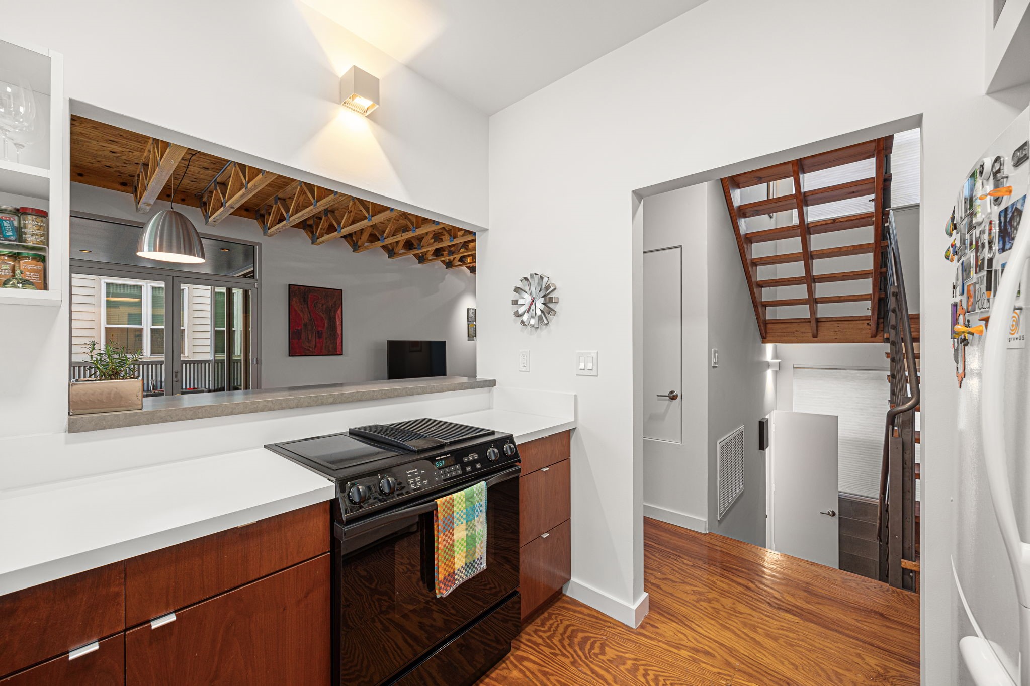 5811 Rose Street Houston, TX 77007 - Photo 11 of 40 The kitchen offers a continuation of clean, simple yet extremely functional space. Subtle yet valuable details include Walnut cabinet fronts, European style hinges and heavy duty full-extension drawers.
