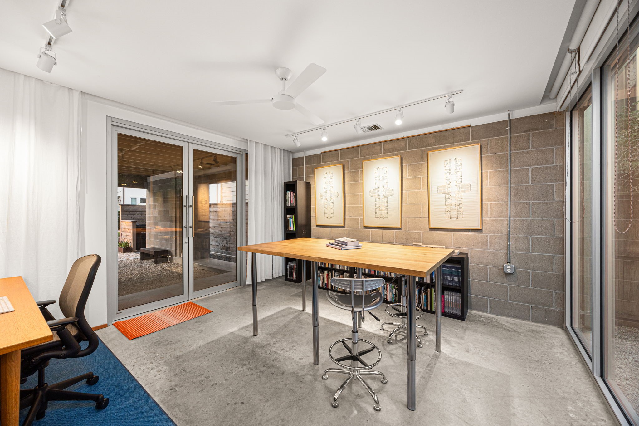 5811 Rose Street Houston, TX 77007 - Photo 3 of 40 First floor office (14.8 x 13.7) with separate entrance previously used as an architect's studio, can easily flex into a gym, hobby room, art studio...the choice is yours. ELEVATOR READY!
