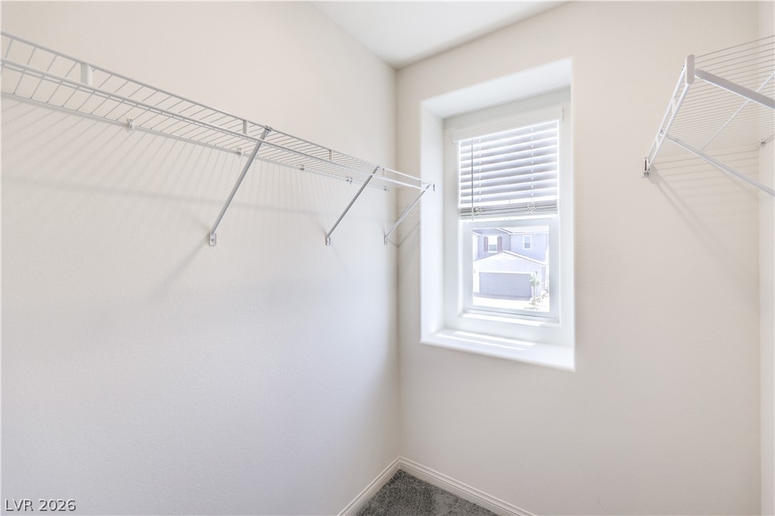 3782 Alla Rocca Avenue Henderson, NV 89044 - Photo 33 of 55 This functional walk-in closet offers convenient storage solutions and ample natural light.