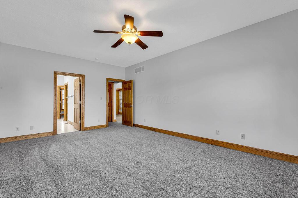 330 Longshore Road Sunbury, OH 43074 - Photo 27 of 73 First Floor Primary Bedroom
