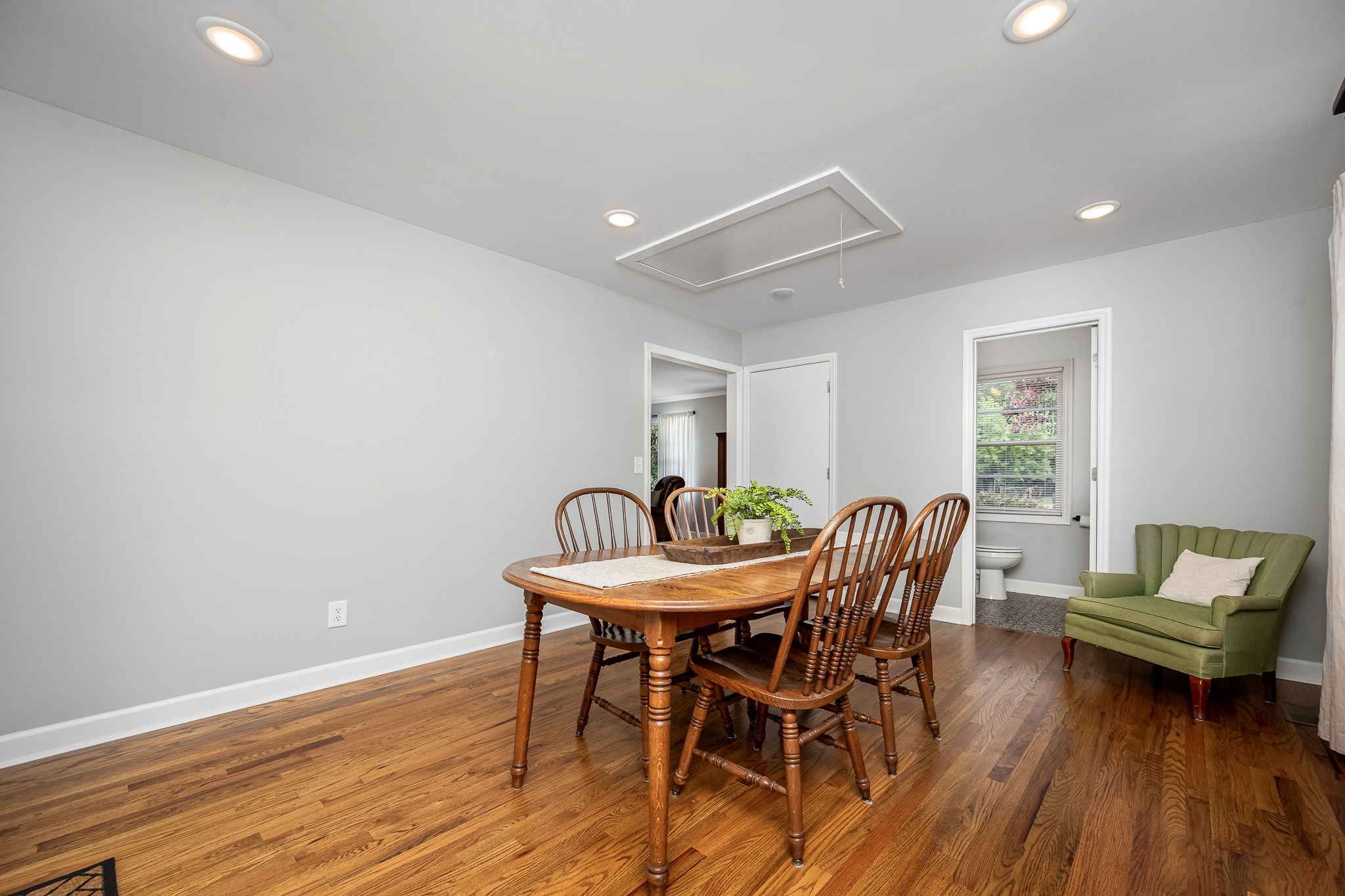 607 Staley Street Murfreesboro, TN 37129 - Photo 13 of 31 a view of a dining room with furniture and wooden floor