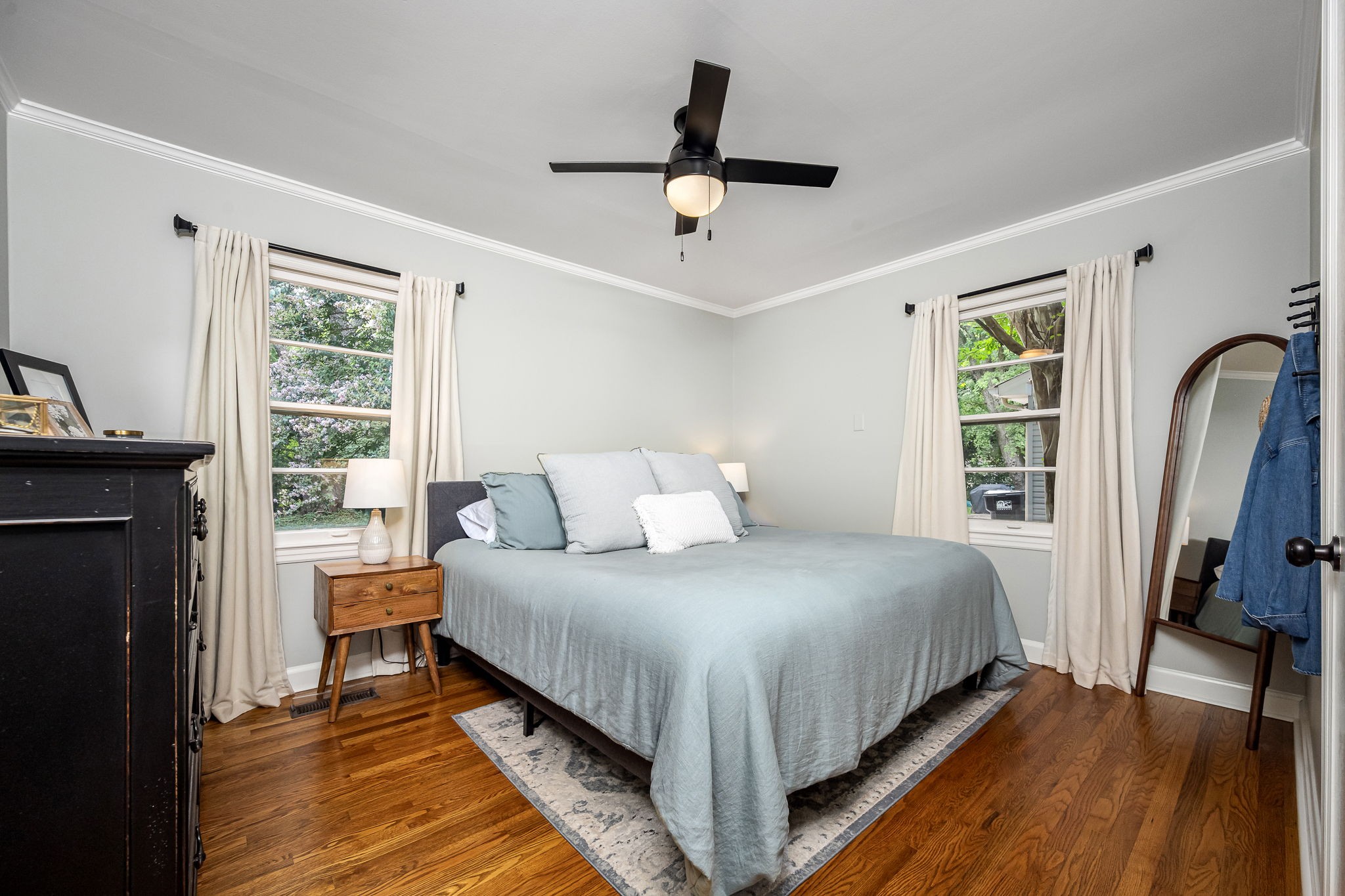 607 Staley Street Murfreesboro, TN 37129 - Photo 16 of 31 a bedroom with a bed a flat screen tv and a window