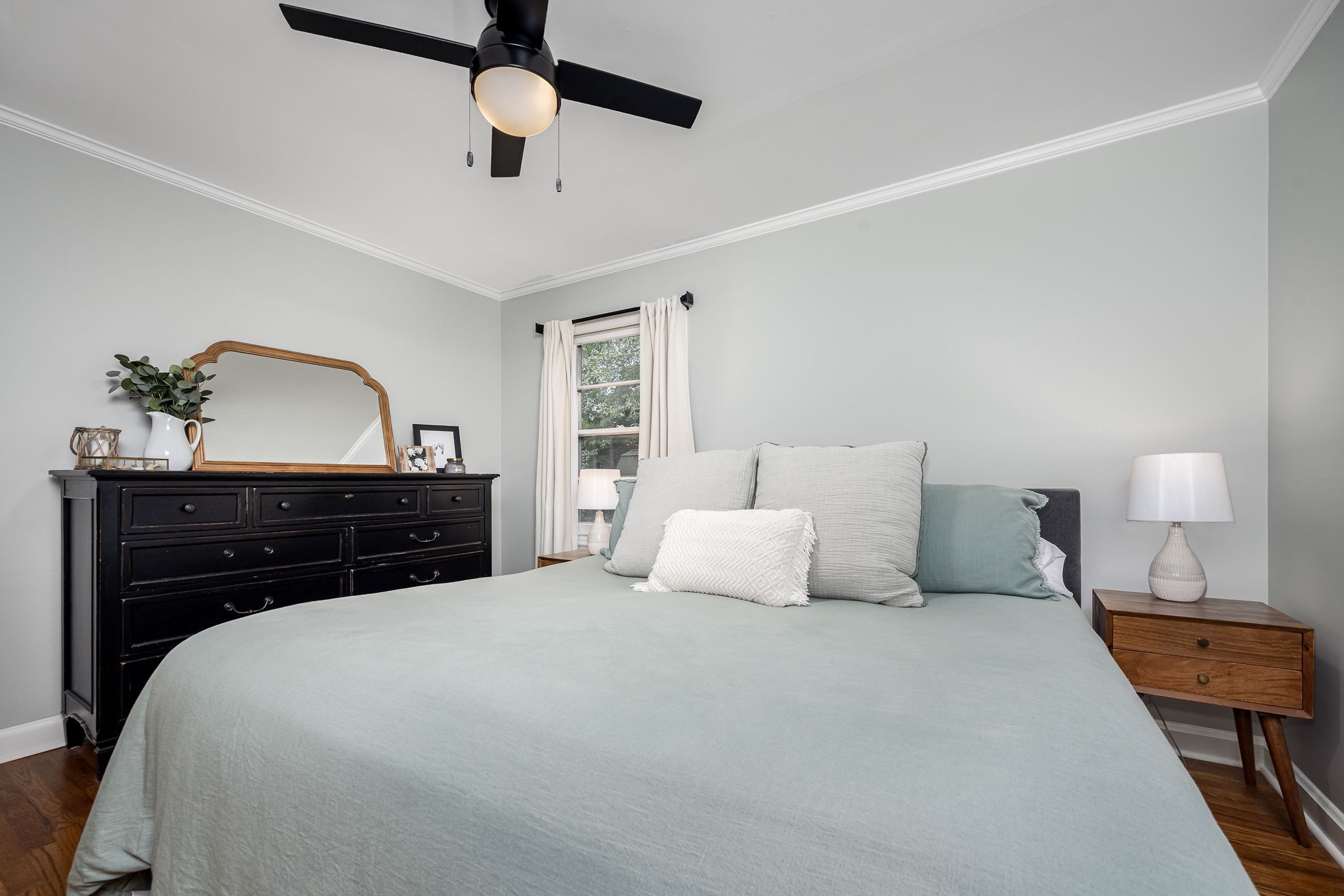 607 Staley Street Murfreesboro, TN 37129 - Photo 17 of 31 a bedroom with a bed and a potted plant