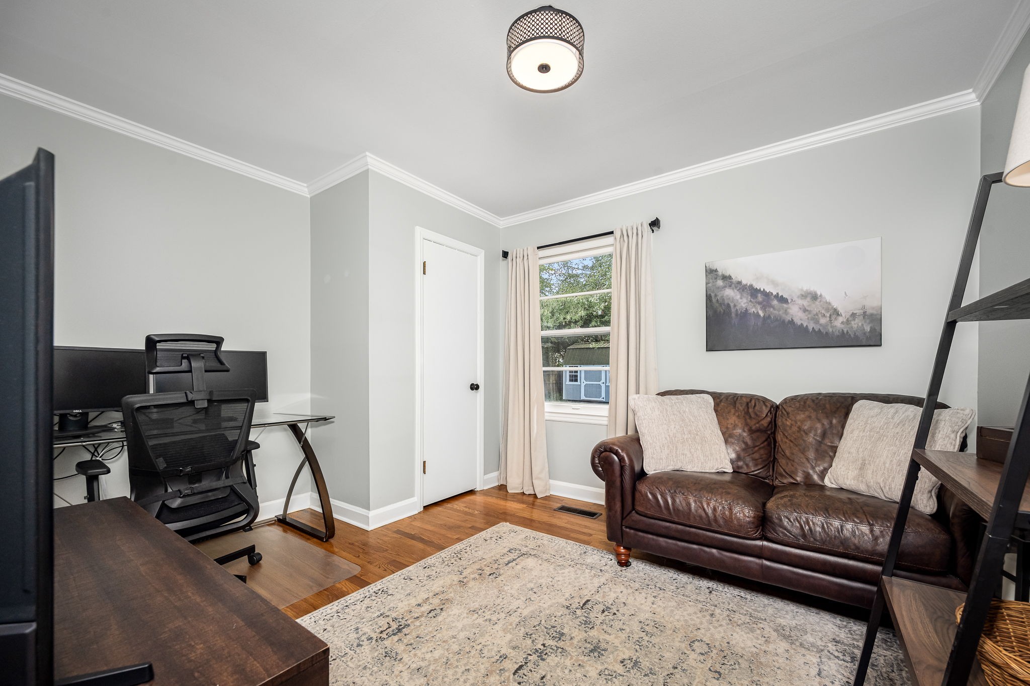 607 Staley Street Murfreesboro, TN 37129 - Photo 18 of 31 a living room with furniture and a flat screen tv