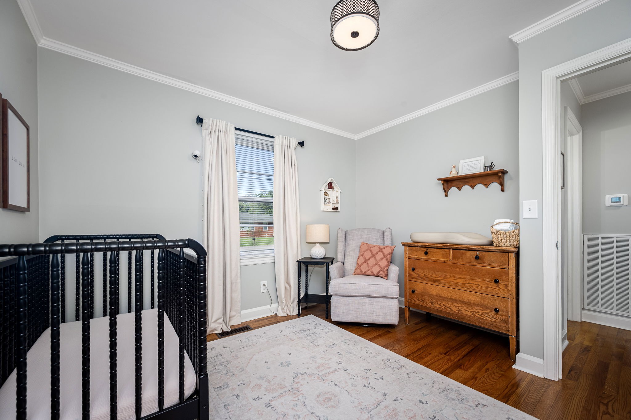 607 Staley Street Murfreesboro, TN 37129 - Photo 21 of 31 a view of a bedroom with furniture and windows