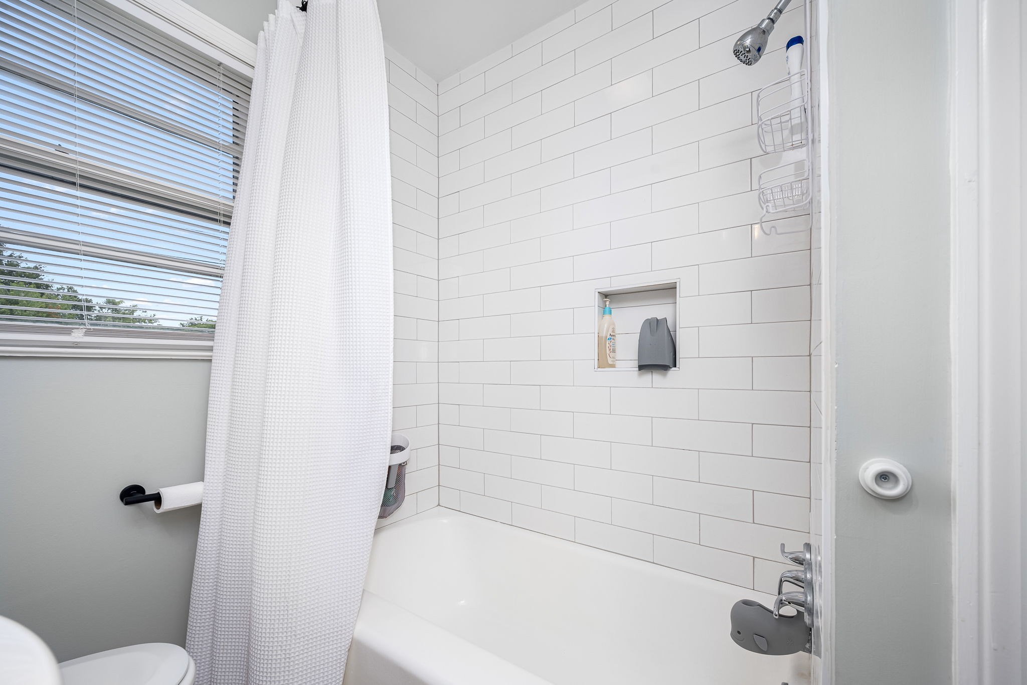 607 Staley Street Murfreesboro, TN 37129 - Photo 23 of 31 a bathroom with a shower