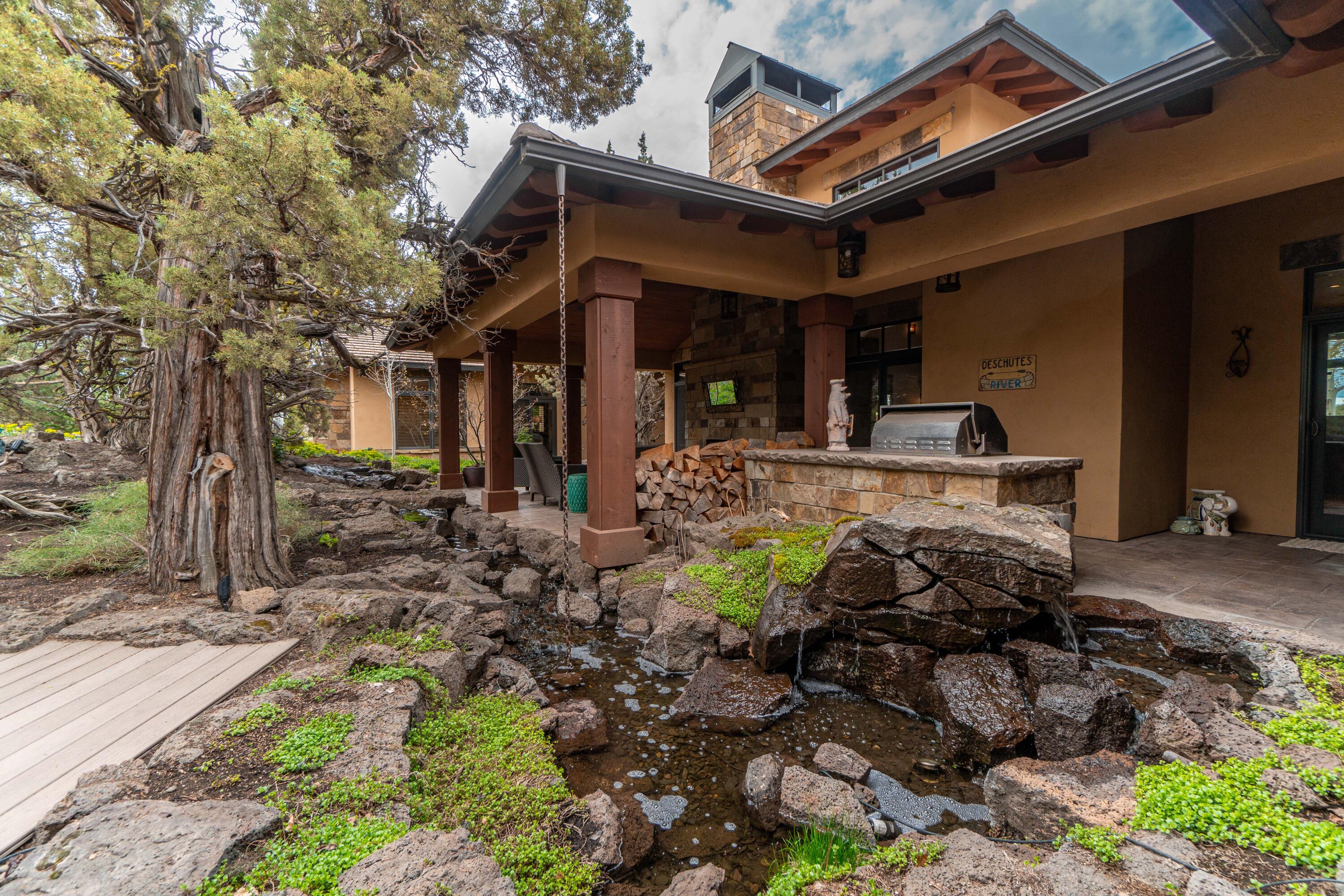 65904 Fazio Ln Bend Bend, OR 97701 - Photo 50 of 63 Relax by the peaceful, custom water features...truly your own private sanctuary.