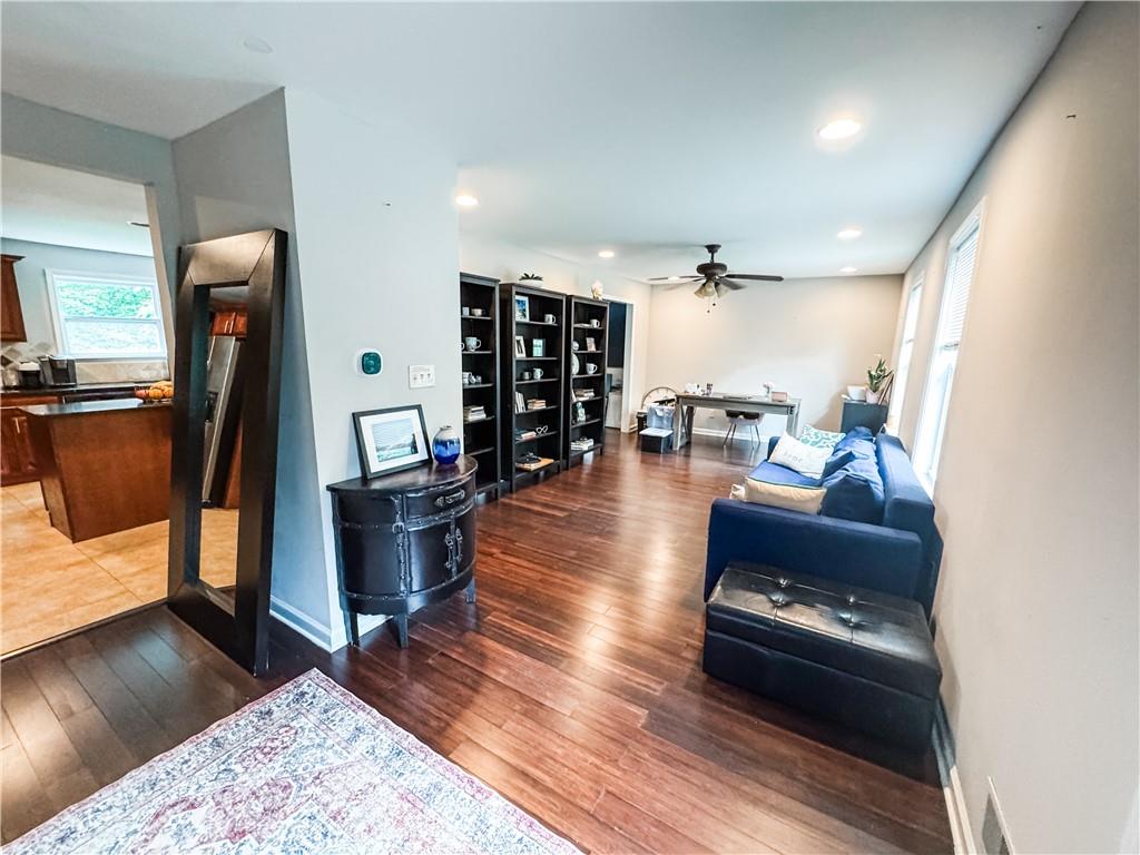 230 Chaffin Ridge Trace Roswell, GA 30075 - Photo 11 of 23 a living room with furniture and a flat screen tv