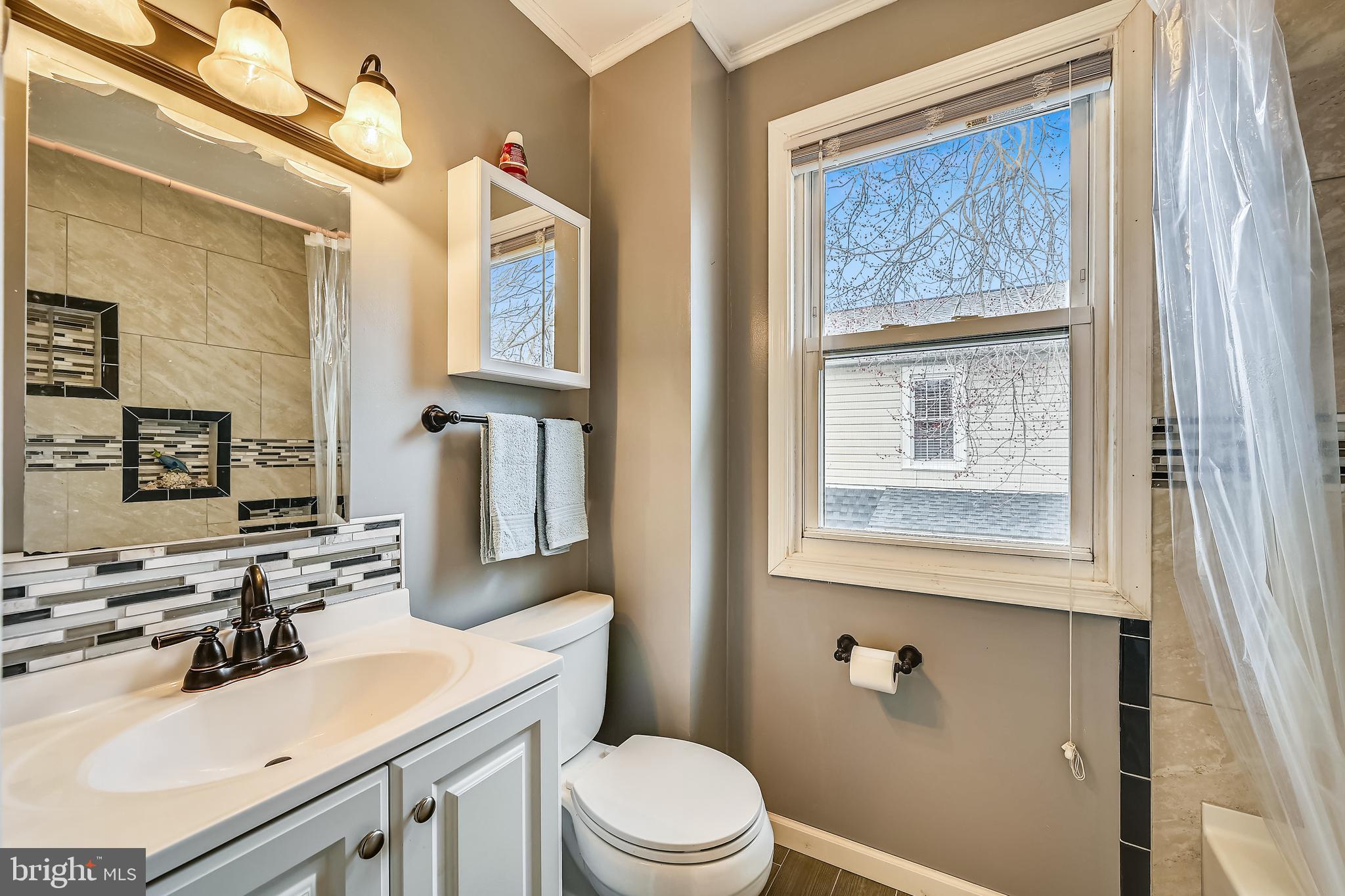 203 Bar Harbor Road Pasadena, MD 21122 - Photo 8 of 38 Updated bath on 2nd floor