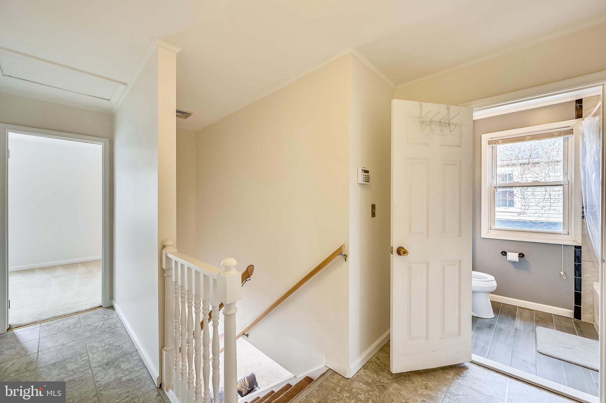 203 Bar Harbor Road Pasadena, MD 21122 - Photo 14 of 38 Upstairs landing, freshly painted throughout