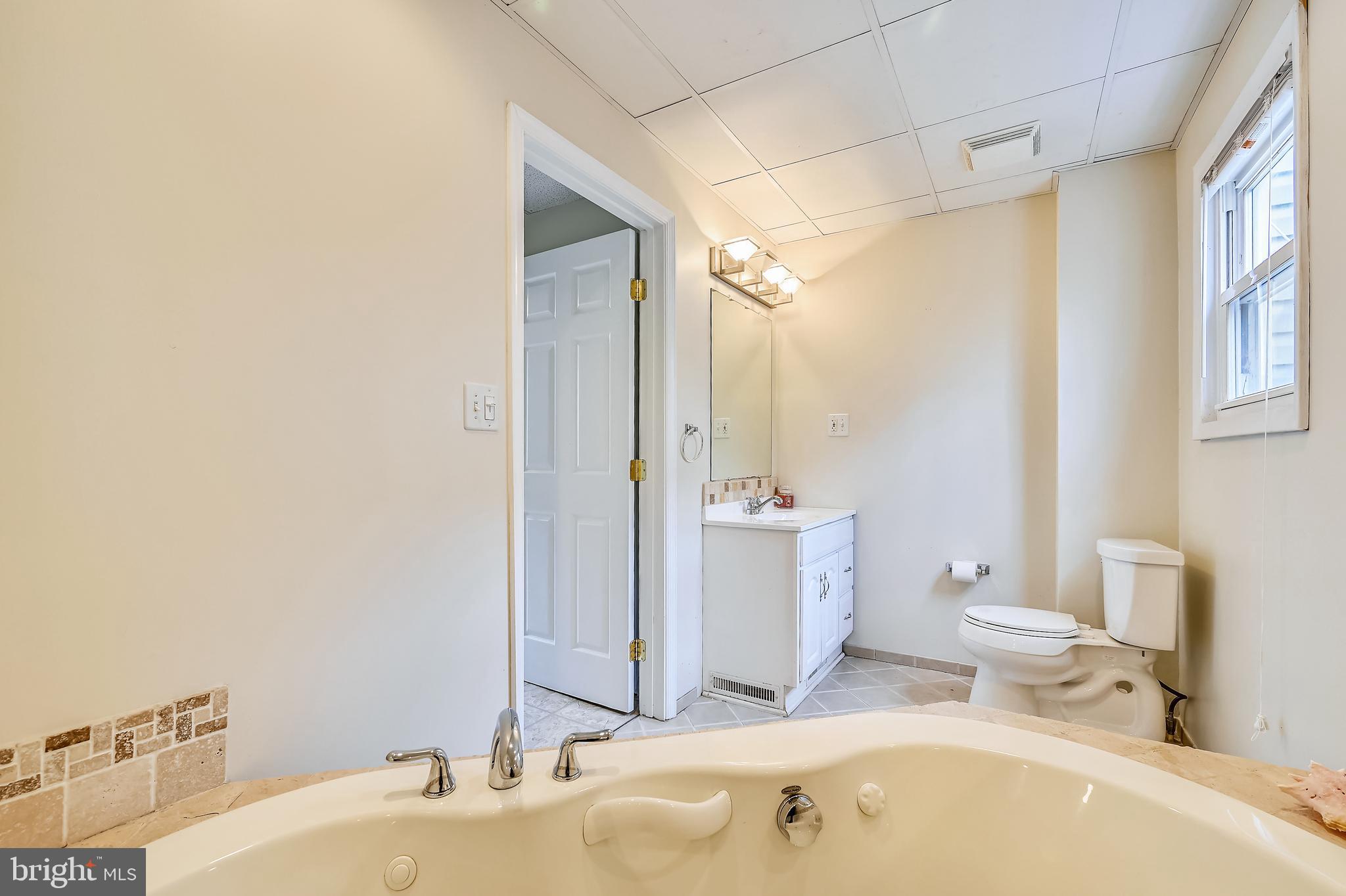 203 Bar Harbor Road Pasadena, MD 21122 - Photo 15 of 38 Updated bathroom on 1st floor