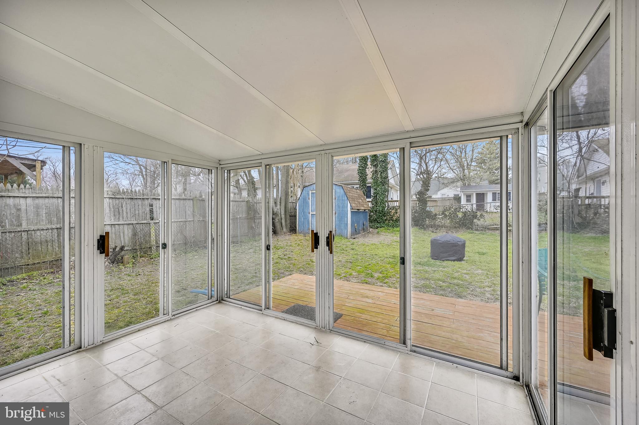 203 Bar Harbor Road Pasadena, MD 21122 - Photo 17 of 38 Enclosed porch