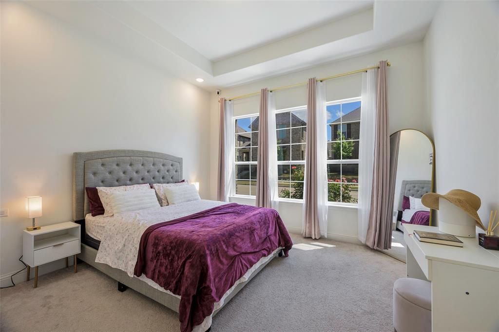 3603 Scotsman Road Sachse, TX 75048 - Photo 13 of 33 a bedroom with a bed and a large window