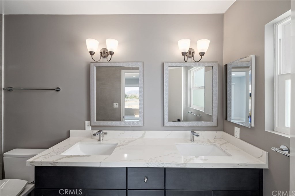 5 Clipper Road, Unit A Rancho Palos Verdes, CA 90275 - Photo 9 of 20 a bathroom with a sink and a mirror