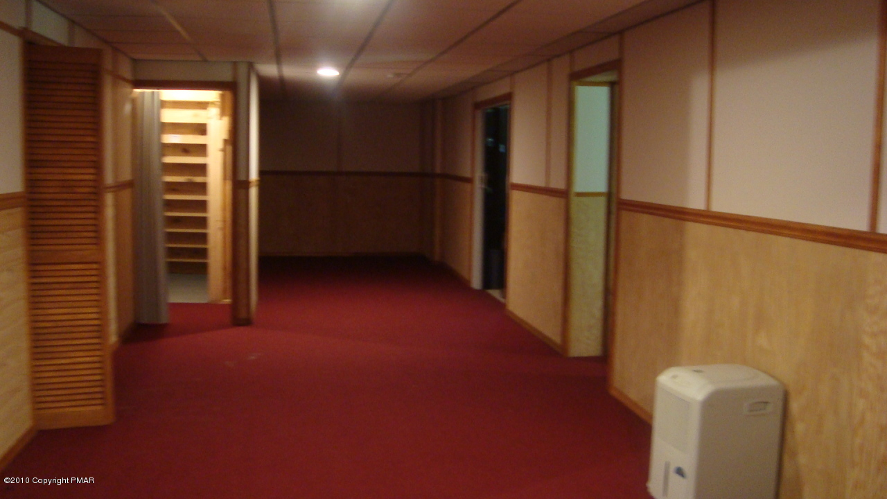 10112 Swiftwater Road Mount Pocono, PA 18344 - Photo 15 of 17 Rec Room/Game Room from the other end