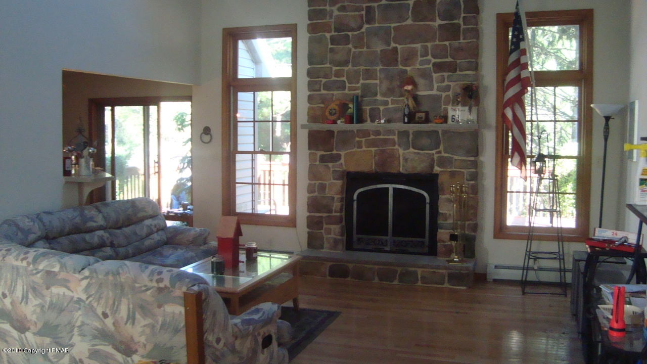 10112 Swiftwater Road Mount Pocono, PA 18344 - Photo 2 of 17 Living Room w/wood floors & fireplace