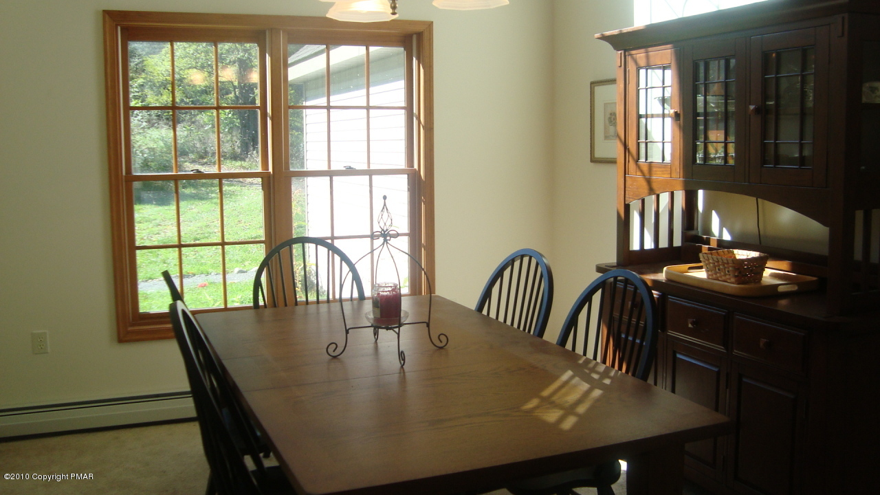 10112 Swiftwater Road Mount Pocono, PA 18344 - Photo 4 of 17 Dining Room with wood floors