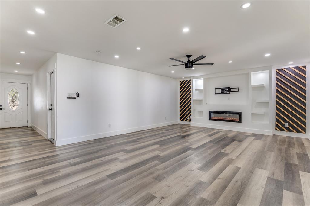 6617 Starnes Road Watauga, TX 76148 - Photo 3 of 22 a view of an empty room with a window