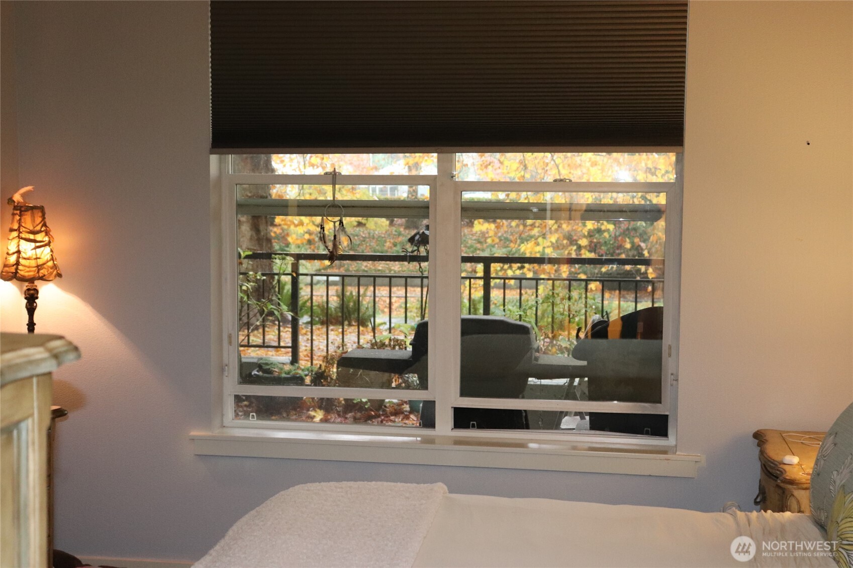 55 Williams Avenue South, Unit 104 Renton, WA 98057 - Photo 16 of 22 a view of a room that has a bed and a window