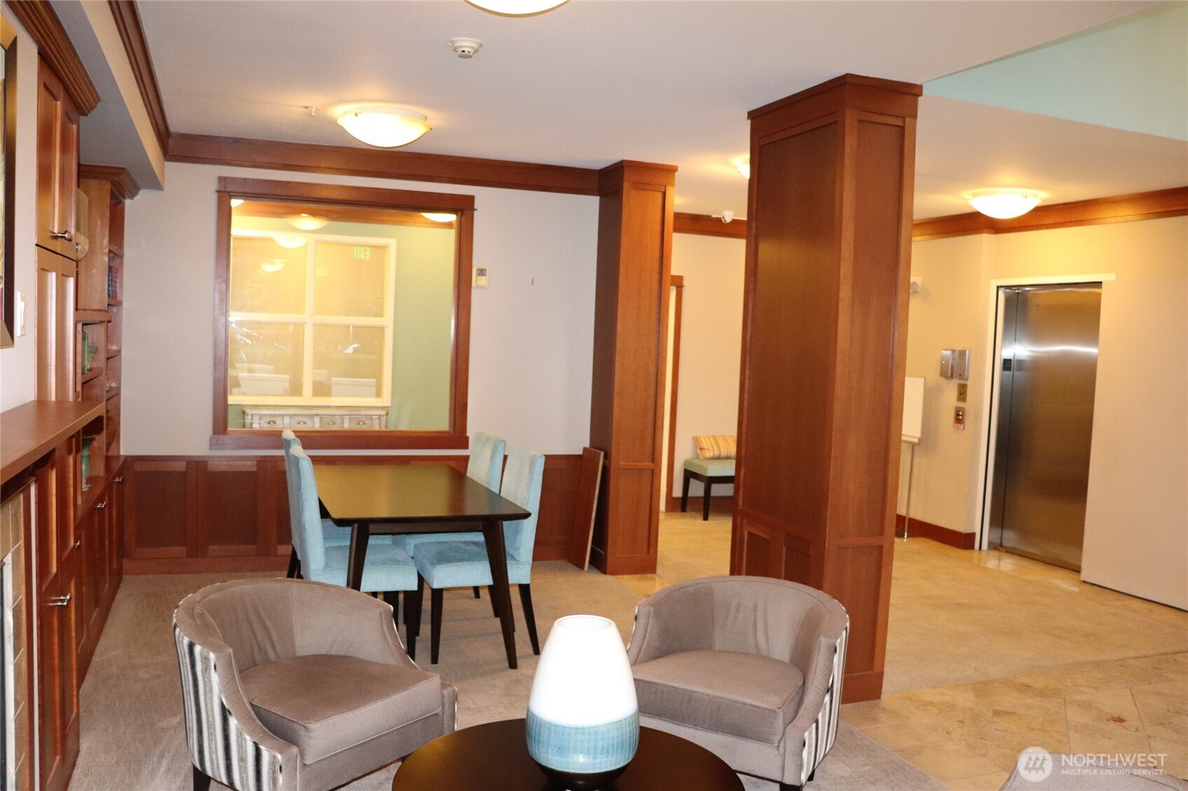 55 Williams Avenue South, Unit 104 Renton, WA 98057 - Photo 20 of 22 a living room with furniture and a window