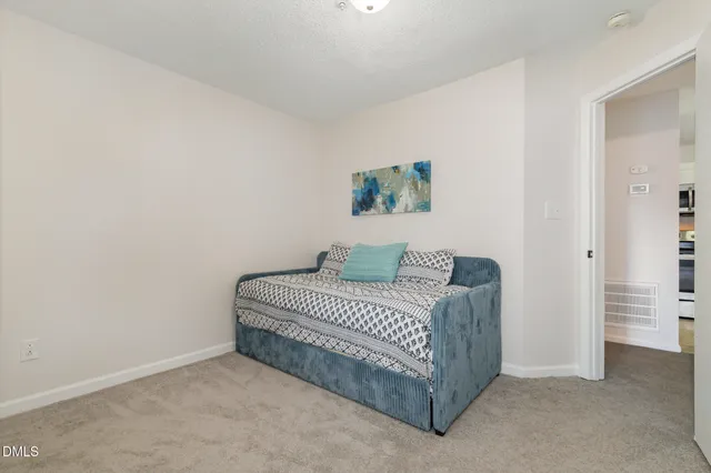 a kitchen with stainless steel appliances granite countertop a refrigerator stove and microwave