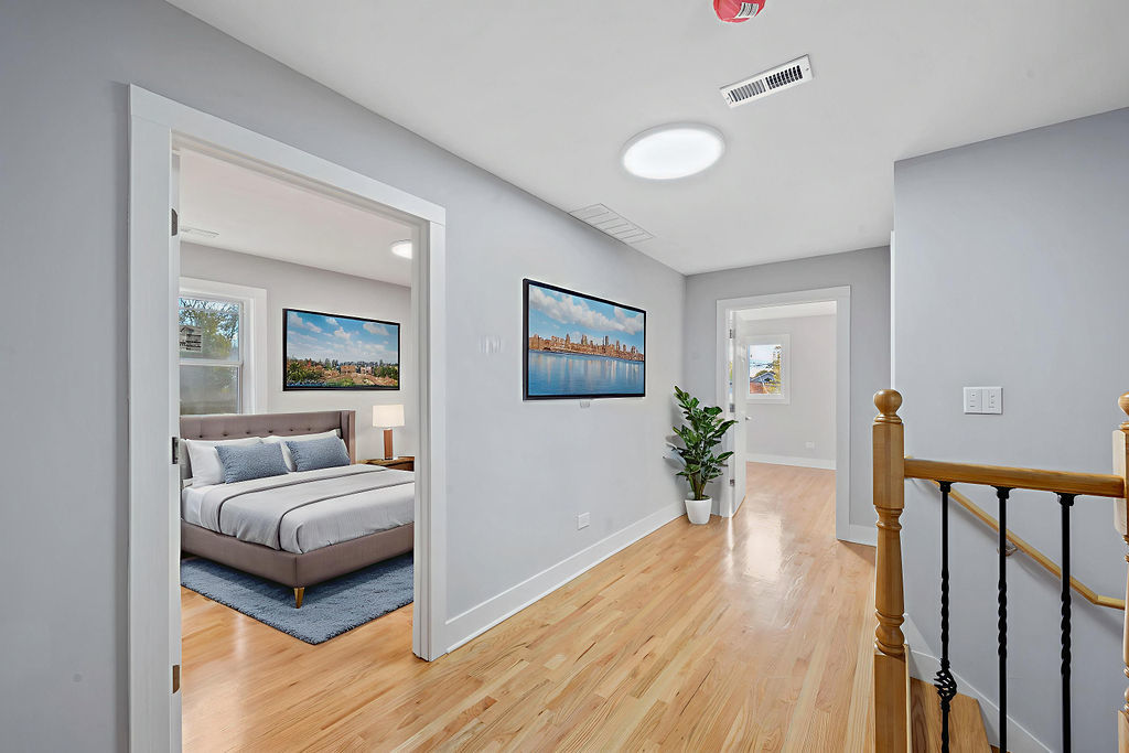13518 South Ave K Chicago, IL 60633 - Photo 15 of 24 a living room with furniture and a wooden floor