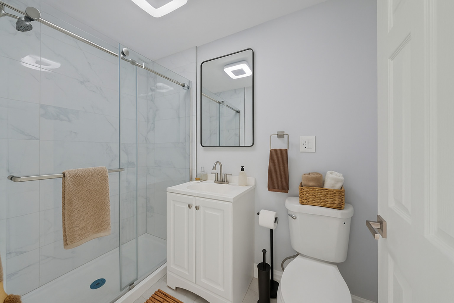 13518 South Ave K Chicago, IL 60633 - Photo 19 of 24 a bathroom with a toilet sink vanity and mirror