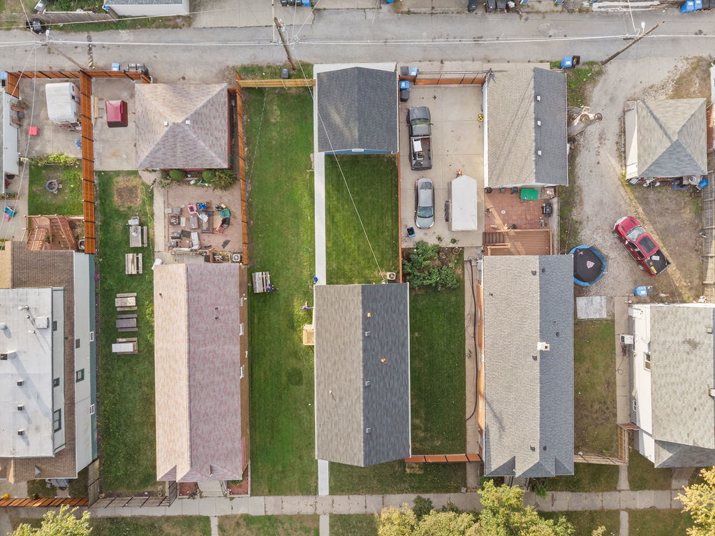 13518 South Ave K Chicago, IL 60633 - Photo 3 of 24 an aerial view of residential houses with outdoor space