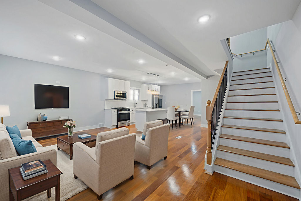 13518 South Ave K Chicago, IL 60633 - Photo 6 of 24 a living room with furniture and a flat screen tv