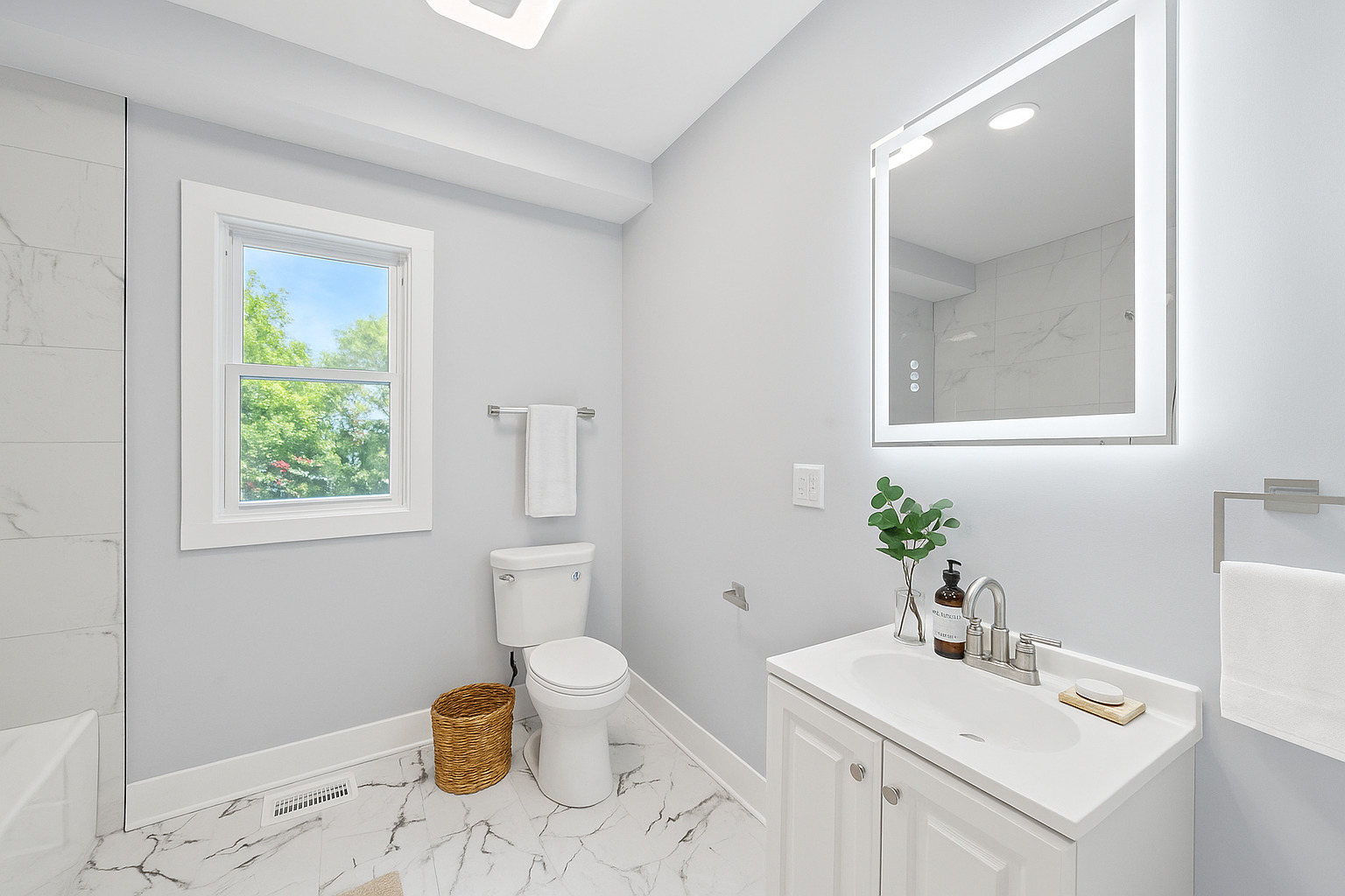 13518 South Ave K Chicago, IL 60633 - Photo 8 of 24 a bathroom with a sink toilet and a mirror