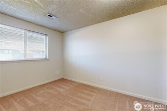 1928 J Street, Unit 205 Walla Walla, WA 99362 - Photo 11 of 20 an empty room with a windows