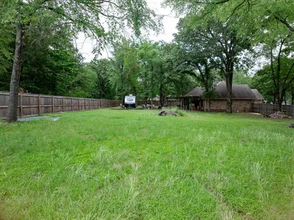 a view of a backyard with a garden