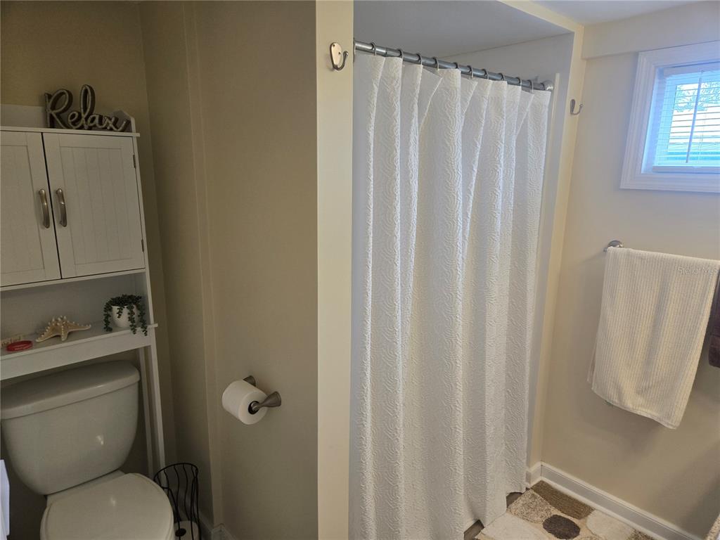 1710 7th Street Southwest, Unit 93 Ruskin, FL 33570 - Photo 29 of 38 a bathroom with a toilet and a sink