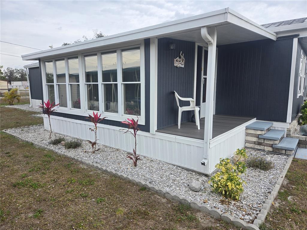 1710 7th Street Southwest, Unit 93 Ruskin, FL 33570 - Photo 31 of 38 a house view with a outdoor space