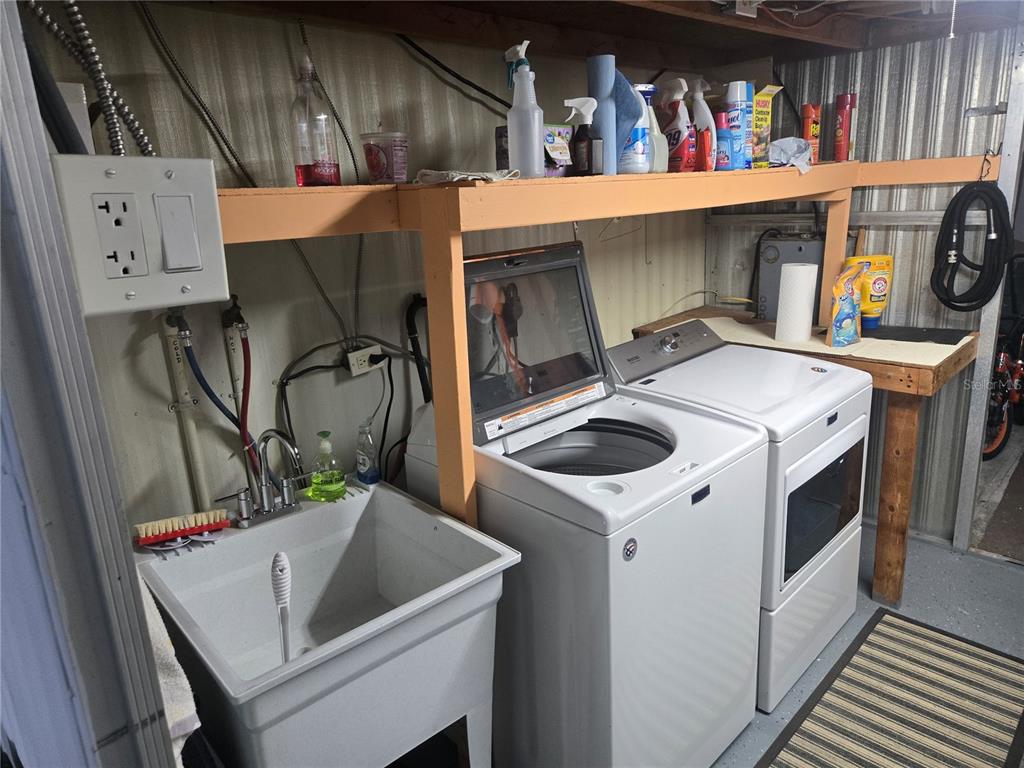 1710 7th Street Southwest, Unit 93 Ruskin, FL 33570 - Photo 7 of 38 a utility room with dryer and washer