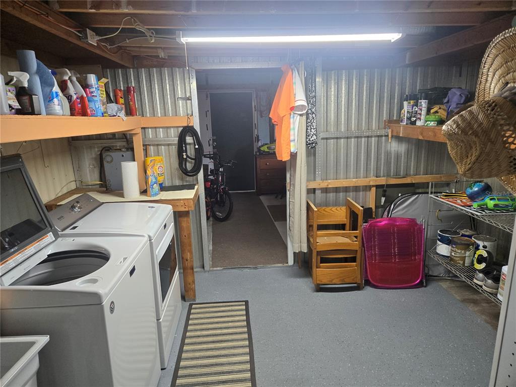 1710 7th Street Southwest, Unit 93 Ruskin, FL 33570 - Photo 8 of 38 a utility room with dryer and washer
