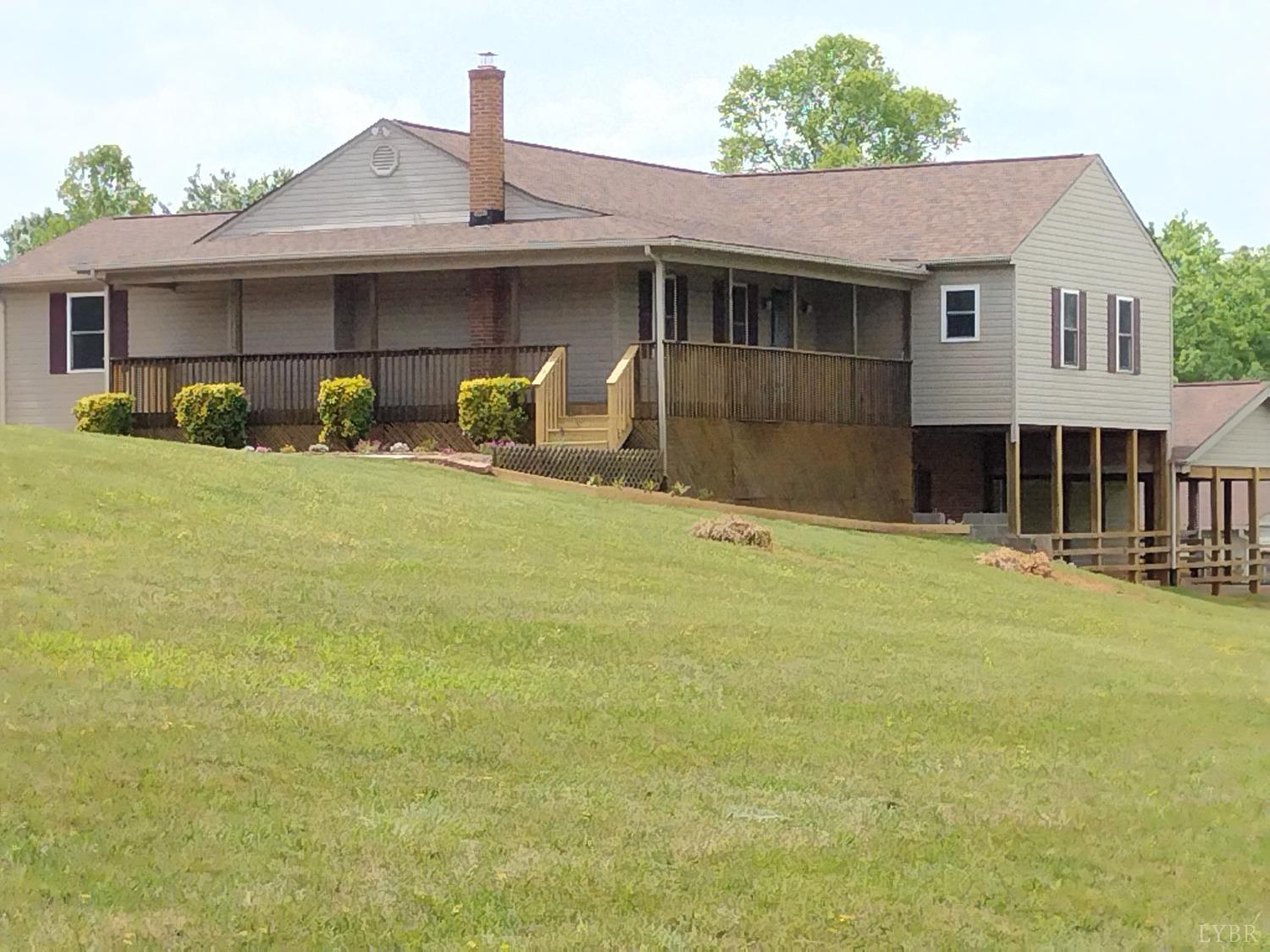 4499 Stage Road Concord, VA 24538 - Photo 1 of 64 a front view of a house with yard