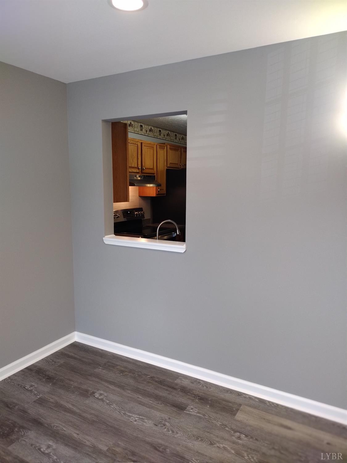 4499 Stage Road Concord, VA 24538 - Photo 17 of 64 a view of a small space with wooden floor and a window