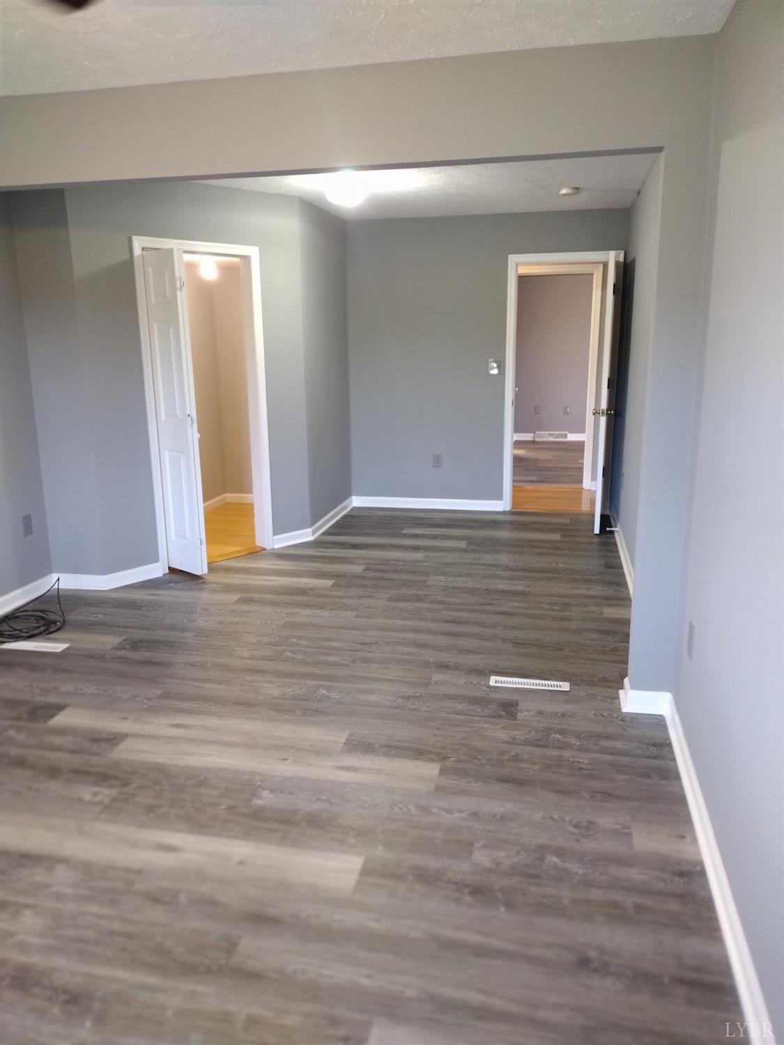 4499 Stage Road Concord, VA 24538 - Photo 23 of 64 a view of an empty room with wooden floor