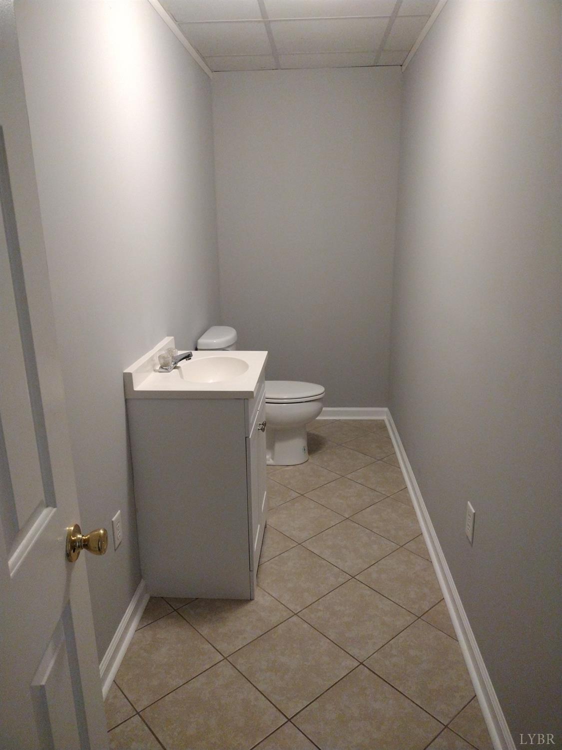 4499 Stage Road Concord, VA 24538 - Photo 39 of 64 a bathroom with a sink toilet and vanity