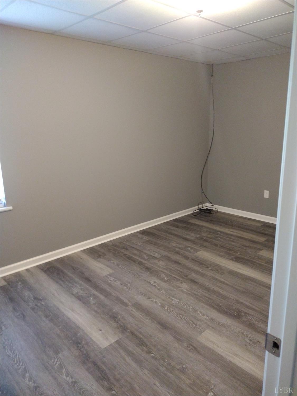 4499 Stage Road Concord, VA 24538 - Photo 40 of 64 a view of an empty room with wooden floor