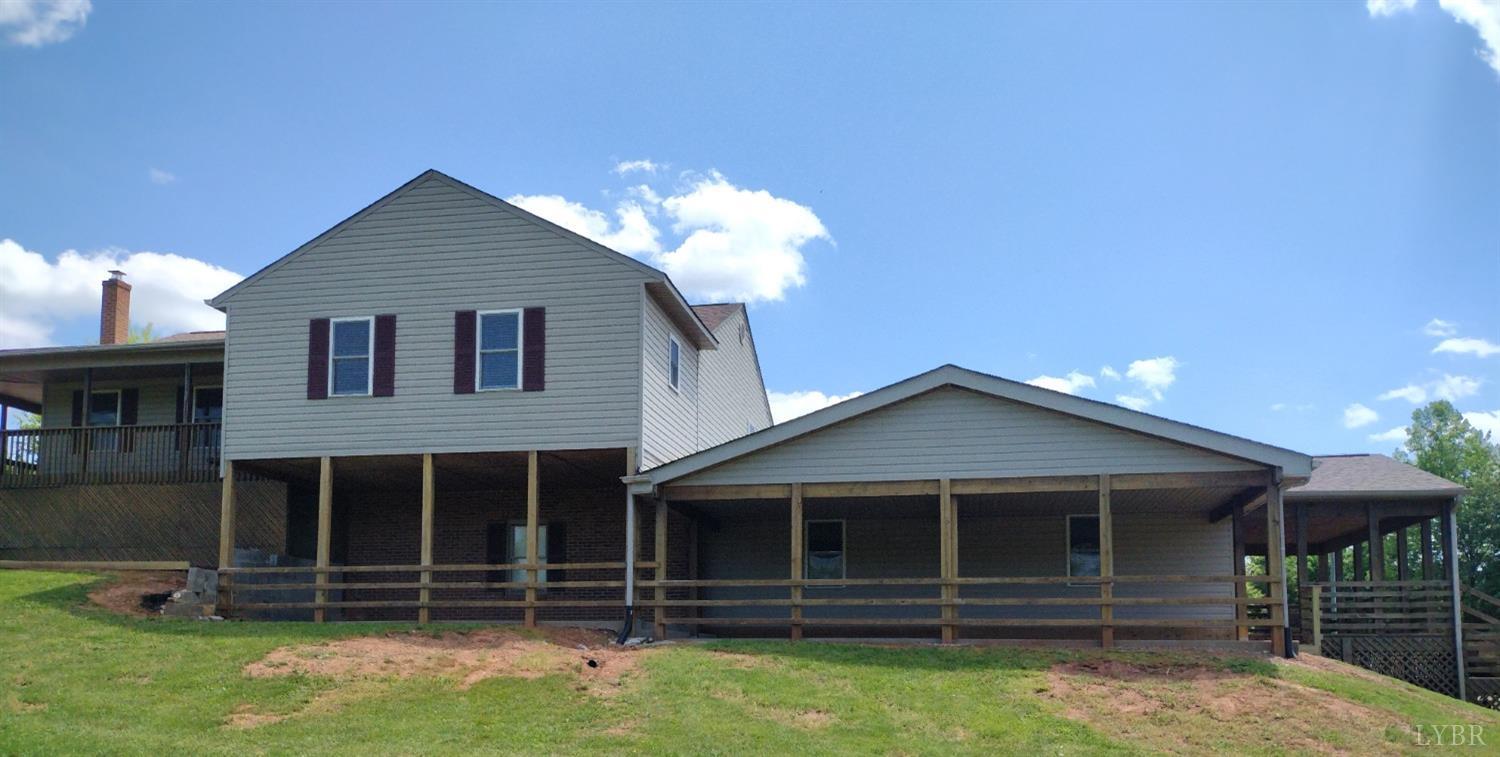 4499 Stage Road Concord, VA 24538 - Photo 4 of 64 a front view of a house with a yard