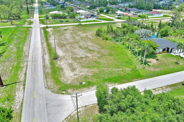 a view of a lake with a yard